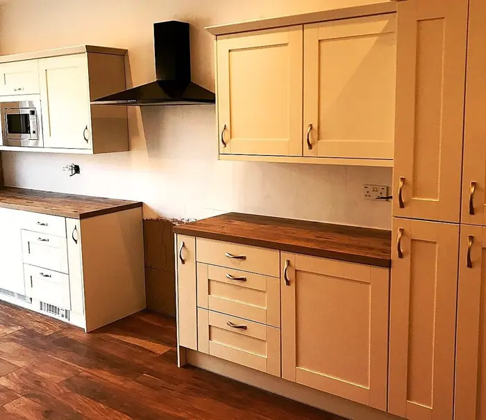 Cream shaker kitchen with solid wood worktops