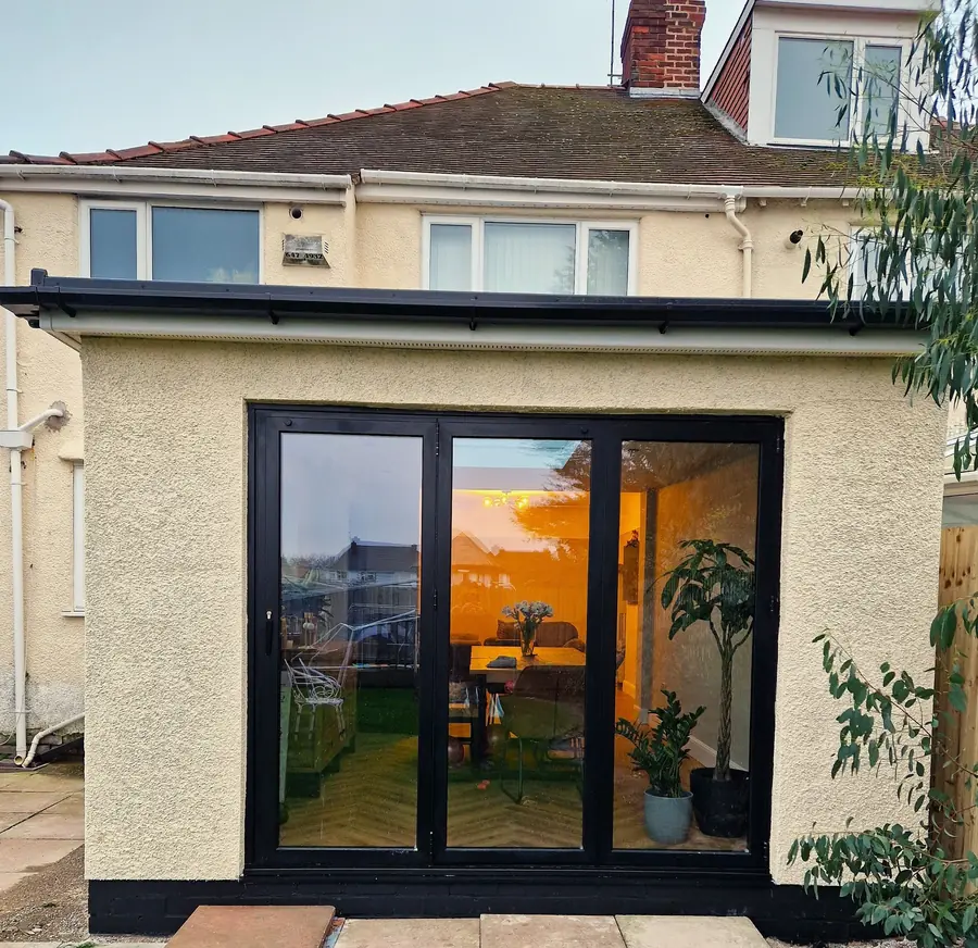 Rendered rear extension with black bifold doors